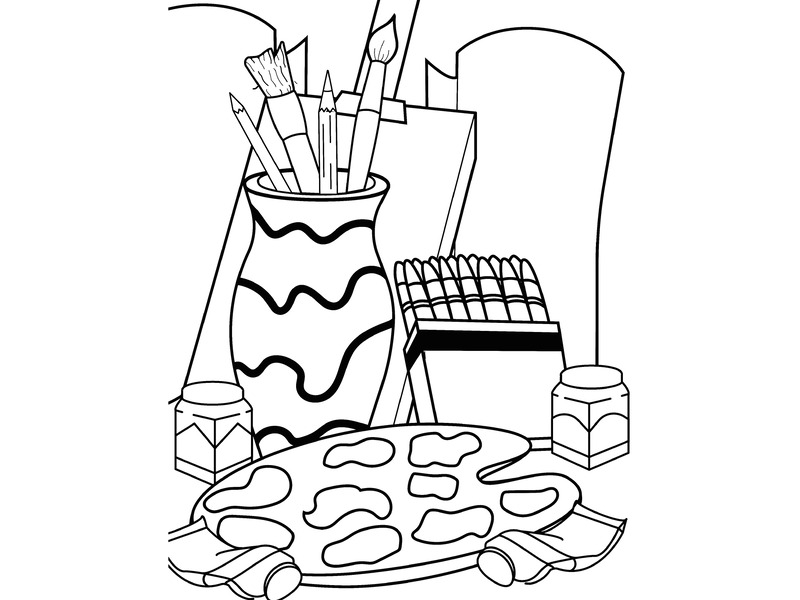 Paint brushes, crayons, paper, and a palette sitting on a table